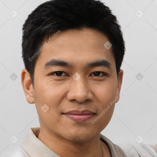 Joyful asian young-adult male with short  black hair and brown eyes