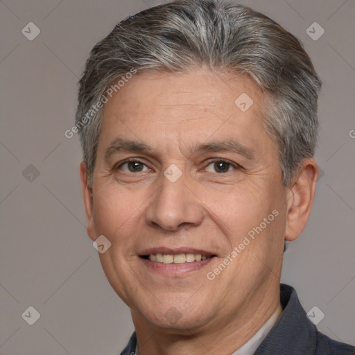 Joyful white middle-aged male with short  brown hair and brown eyes