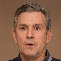 Neutral white middle-aged male with short  brown hair and brown eyes