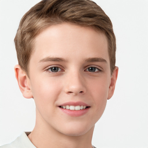 Joyful white child male with short  brown hair and grey eyes