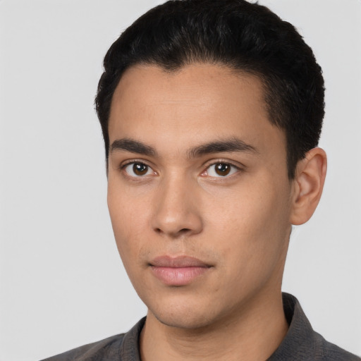 Neutral latino young-adult male with short  black hair and brown eyes