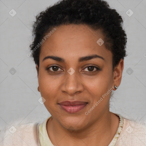 Joyful black young-adult female with short  brown hair and brown eyes