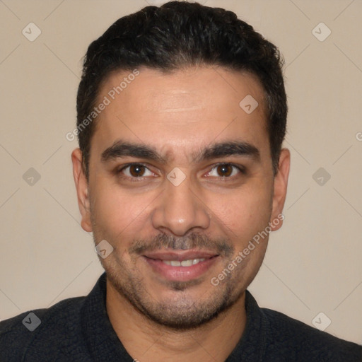 Joyful white young-adult male with short  black hair and brown eyes