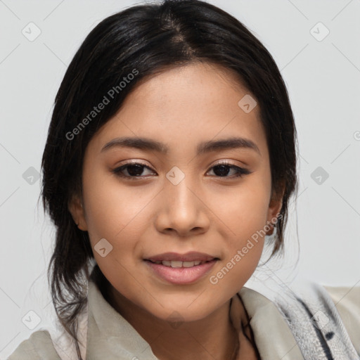 Joyful asian young-adult female with medium  black hair and brown eyes