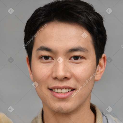 Joyful asian young-adult male with short  brown hair and brown eyes