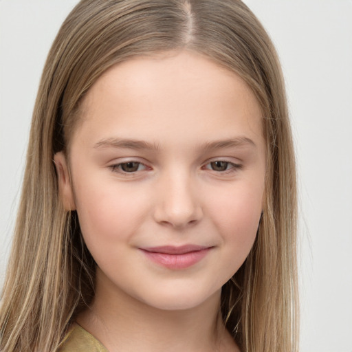 Joyful white child female with long  brown hair and brown eyes