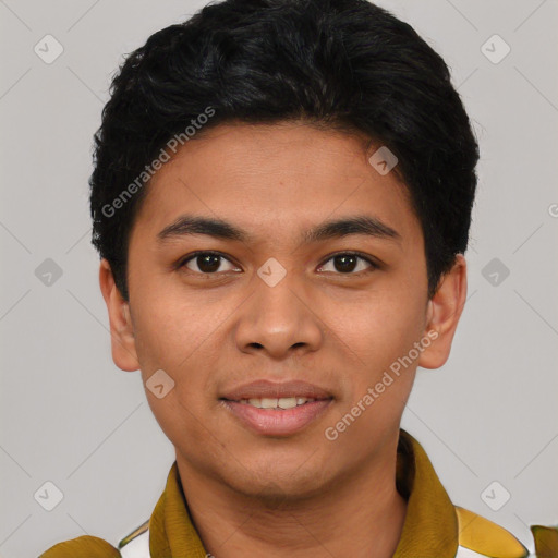 Joyful asian young-adult male with short  black hair and brown eyes