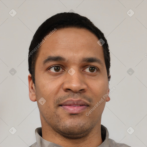 Neutral latino young-adult male with short  black hair and brown eyes