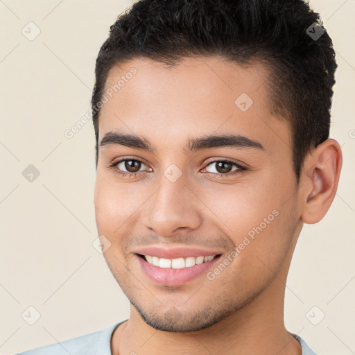 Joyful white young-adult male with short  brown hair and brown eyes