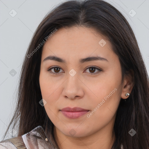 Joyful latino young-adult female with long  brown hair and brown eyes