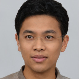 Neutral asian young-adult male with short  black hair and brown eyes