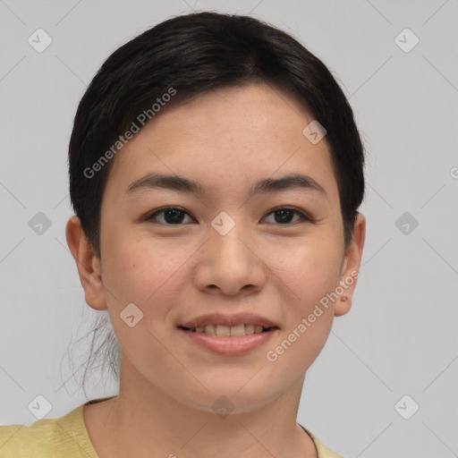 Joyful asian young-adult female with short  brown hair and brown eyes