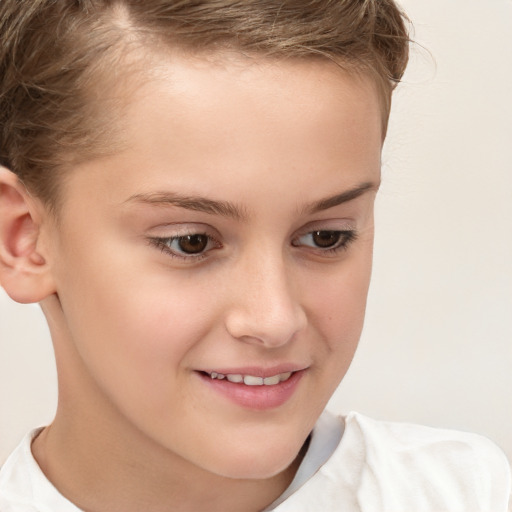 Joyful white child female with short  brown hair and brown eyes