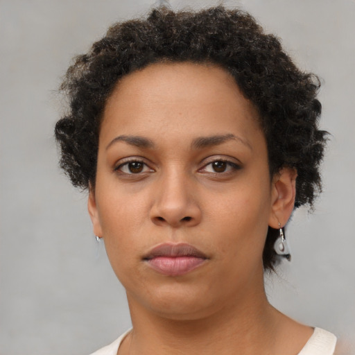Neutral latino young-adult female with short  brown hair and brown eyes