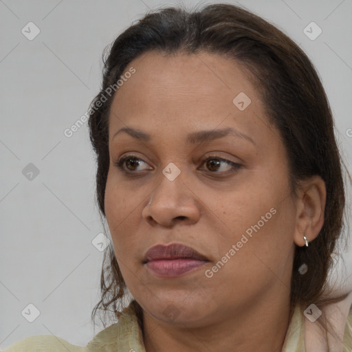 Joyful white adult female with medium  brown hair and brown eyes