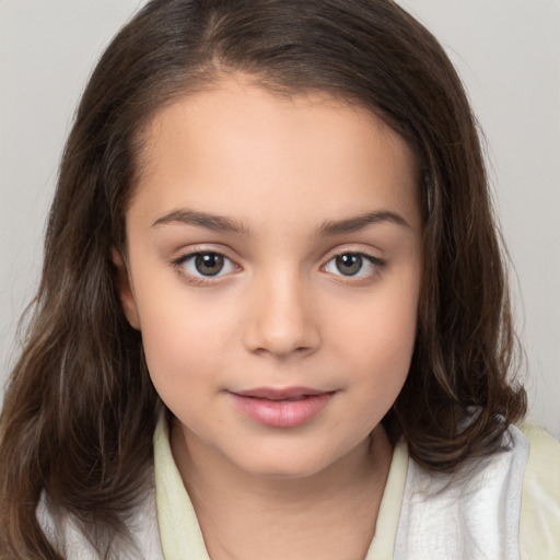 Joyful white child female with medium  brown hair and brown eyes