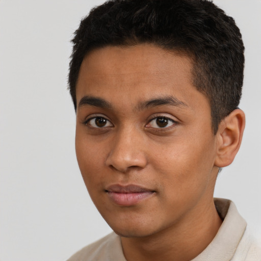 Neutral latino young-adult male with short  black hair and brown eyes