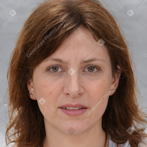 Joyful white adult female with medium  brown hair and brown eyes