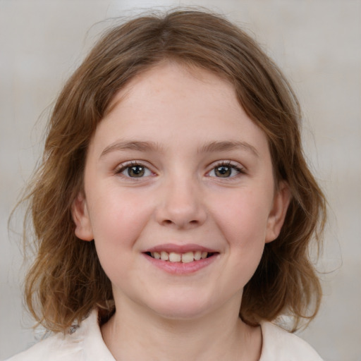 Joyful white child female with medium  brown hair and grey eyes