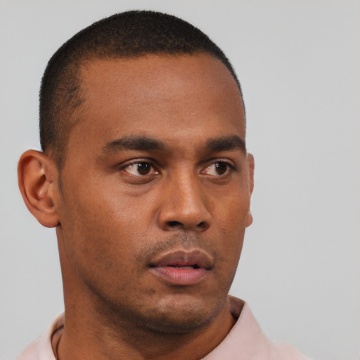 Neutral black young-adult male with short  black hair and brown eyes