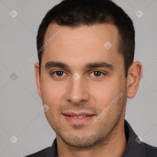 Joyful white young-adult male with short  brown hair and brown eyes