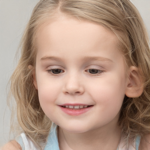 Joyful white child female with medium  brown hair and grey eyes