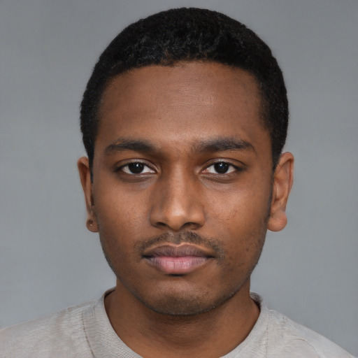 Neutral black young-adult male with short  black hair and brown eyes