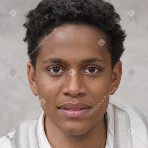 Joyful black young-adult male with short  brown hair and brown eyes