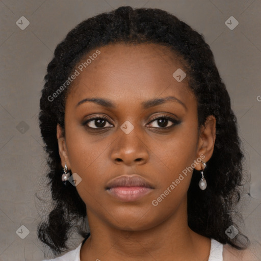 Neutral black young-adult female with medium  black hair and brown eyes