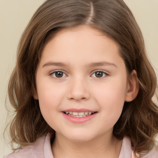 Joyful white child female with medium  brown hair and brown eyes