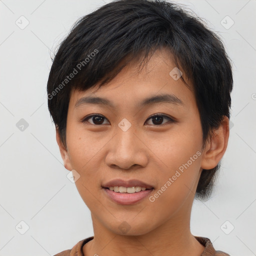 Joyful asian young-adult female with short  black hair and brown eyes