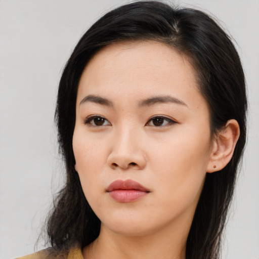 Neutral asian young-adult female with medium  black hair and brown eyes