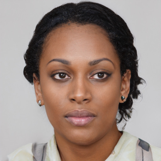 Neutral black young-adult female with long  black hair and brown eyes