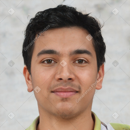 Joyful latino young-adult male with short  black hair and brown eyes