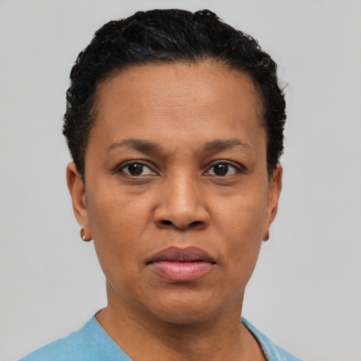 Neutral black adult female with short  black hair and brown eyes