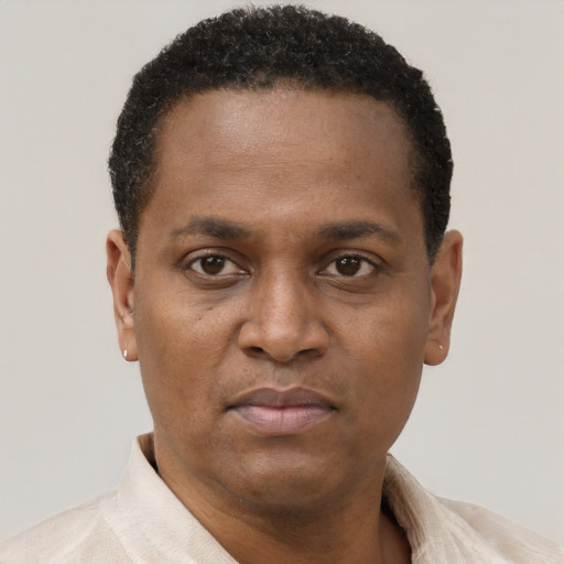 Neutral black young-adult male with short  brown hair and brown eyes