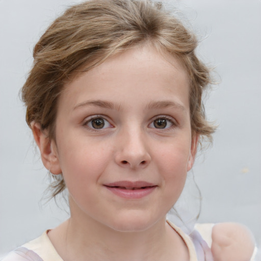 Joyful white child female with medium  brown hair and grey eyes