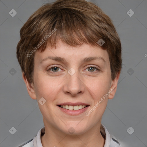 Joyful white young-adult female with short  brown hair and grey eyes