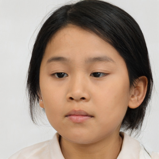 Neutral asian young-adult female with medium  brown hair and brown eyes