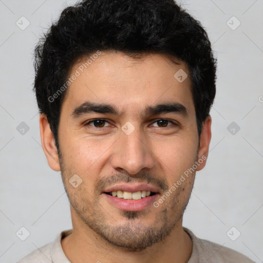 Joyful white young-adult male with short  black hair and brown eyes