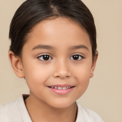 Joyful white child female with medium  brown hair and brown eyes