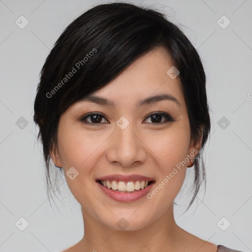 Joyful asian young-adult female with medium  black hair and brown eyes