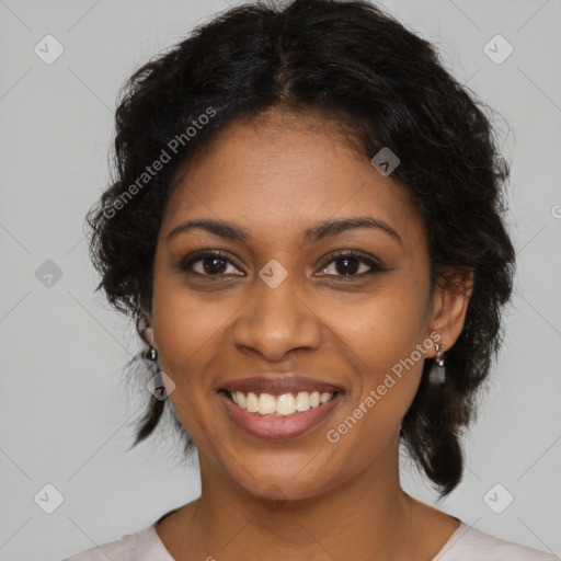 Joyful black young-adult female with medium  brown hair and brown eyes