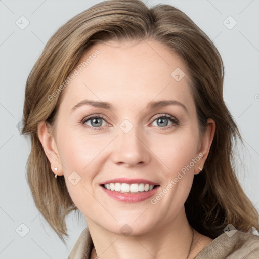 Joyful white young-adult female with medium  brown hair and blue eyes