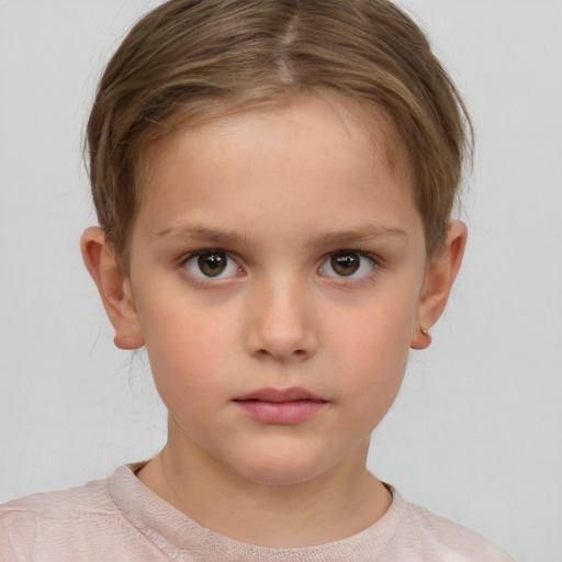 Neutral white child female with short  brown hair and brown eyes