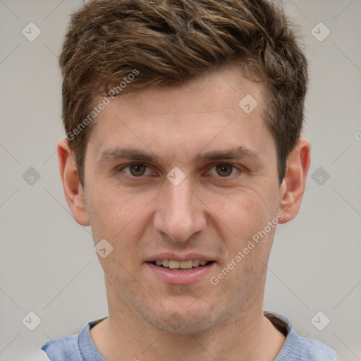 Joyful white adult male with short  brown hair and grey eyes