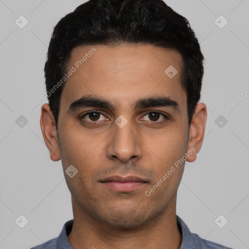 Neutral latino young-adult male with short  black hair and brown eyes