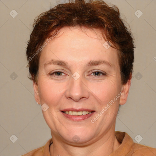 Joyful white adult female with short  brown hair and brown eyes