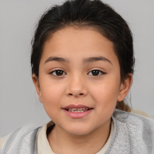 Joyful white child female with medium  brown hair and brown eyes