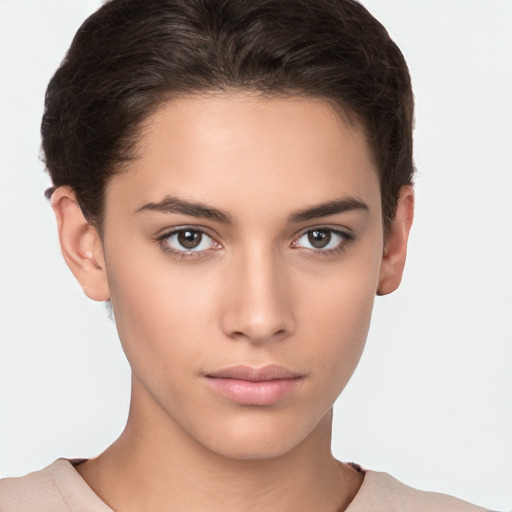 Neutral white young-adult female with short  brown hair and brown eyes